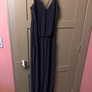 Navy blue jumpsuit, never worn with pockets!